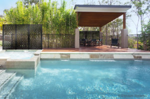 Elysium Decorative Screens House With Large Pool and Outdoor Gazebo Pool House featuring metal decorative screens for outdoor screening and privacy screening