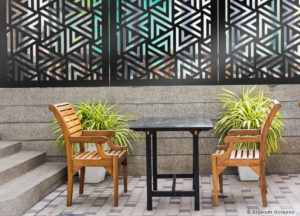 Elysium Decorative Screens Design E001 In A Privacy Panel Above Retaining Wall