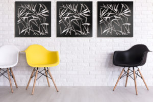 Elysium Decorative Screens Brick Wall with Replica dining chairs featuring panel of three metal deco screens as wall art. Bamboo Design